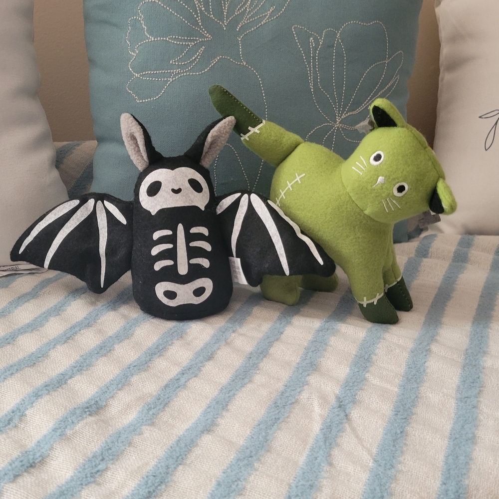Black and Green Plush Toys